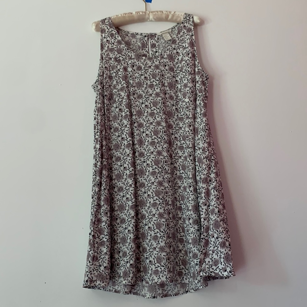 Sundress with pretty floral print.